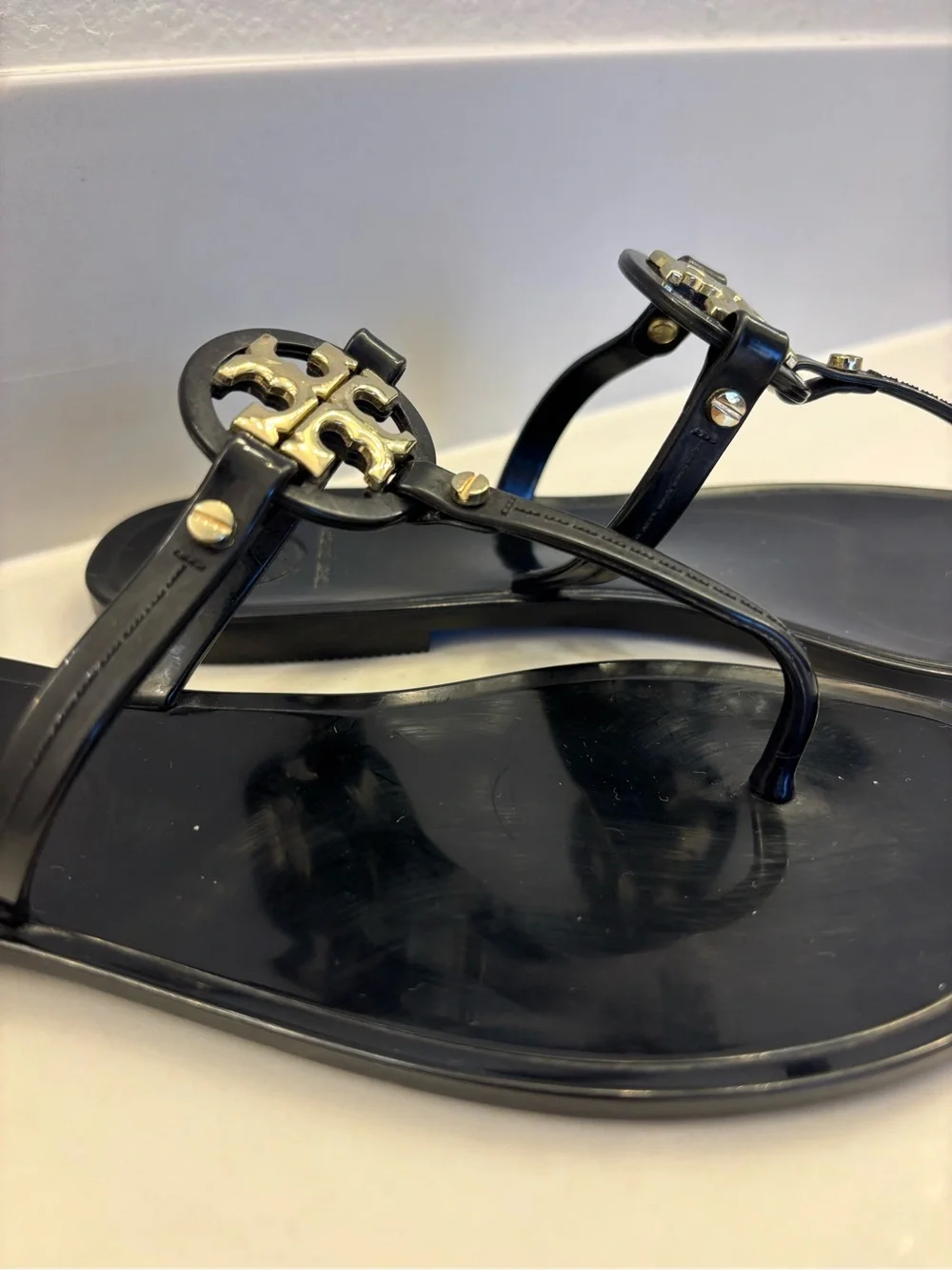 Tory Burch Black Jelly Thong Sandals with Gold Logo